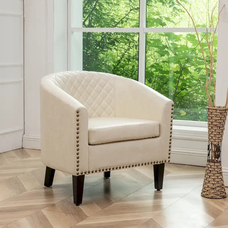 Poltrona club a botte in pelle PU trapuntata con borchie decorative