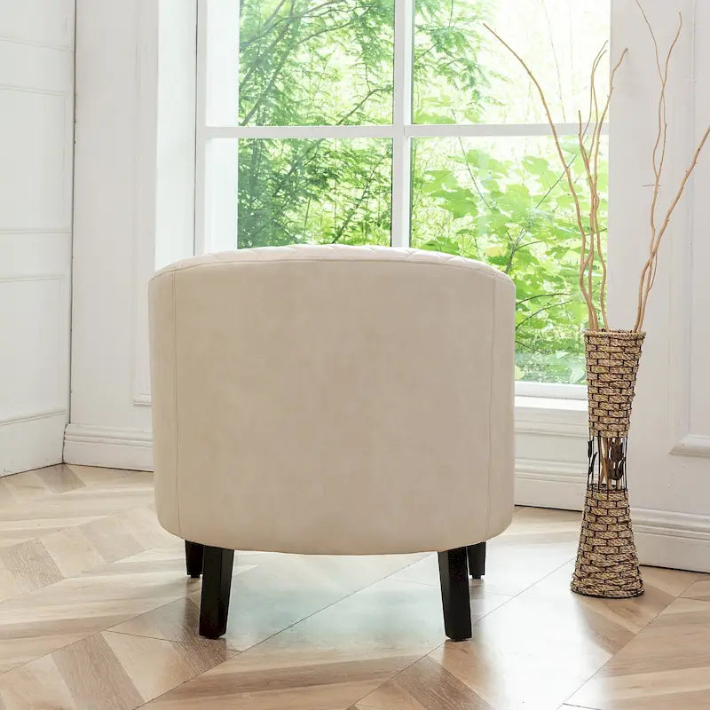 Poltrona club a botte in pelle PU trapuntata con borchie decorative