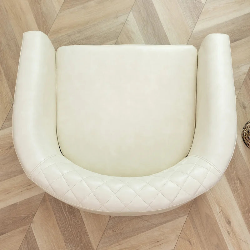 Poltrona club a botte in pelle PU trapuntata con borchie decorative