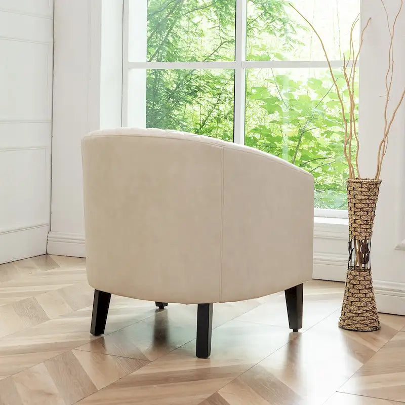 Poltrona club a botte in pelle PU trapuntata con borchie decorative