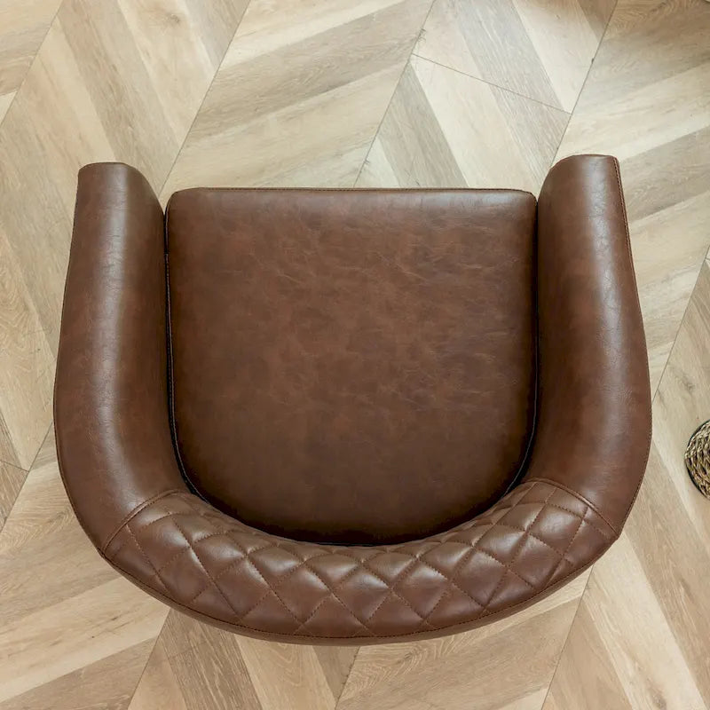 Poltrona club a botte in pelle PU trapuntata con borchie decorative