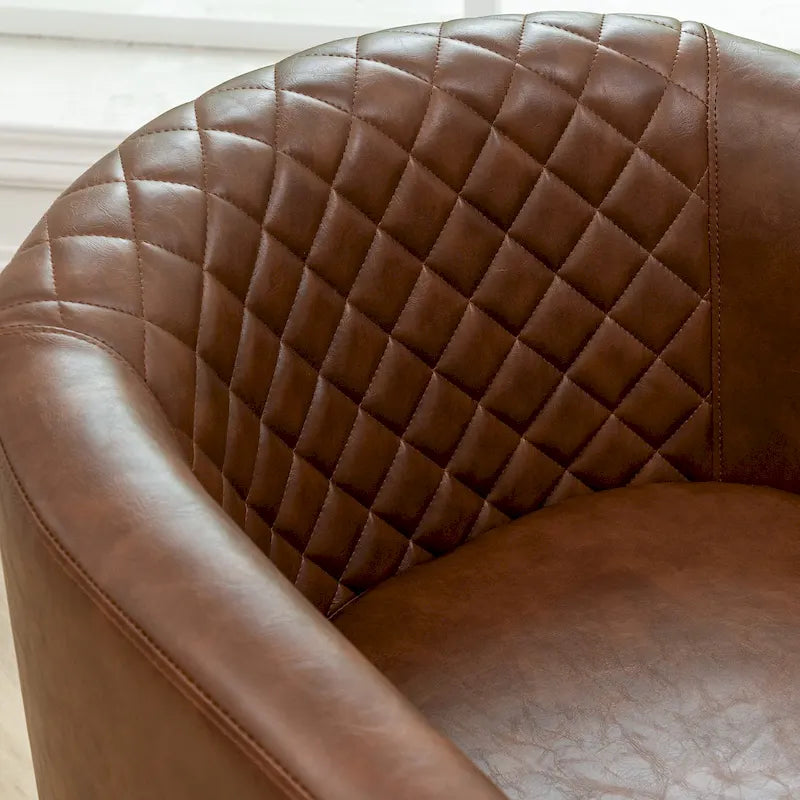 Poltrona club a botte in pelle PU trapuntata con borchie decorative