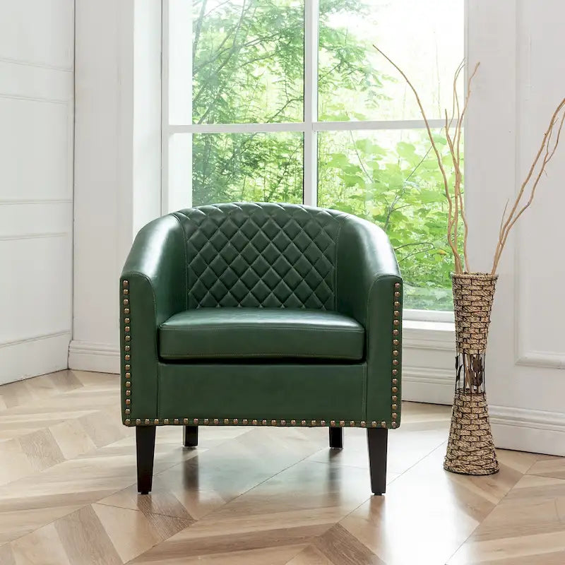 Poltrona club a botte in pelle PU trapuntata con borchie decorative