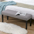 Panca moderna da 44 L con bordino a borchie, imbottita e con gambe in legno